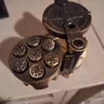 Metal Dice Set of 7, Rotatable Bullet Dice Set Revolver Storage Container photo review