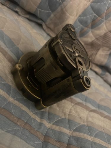 Metal Dice Set of 7, Rotatable Bullet Dice Set Revolver Storage Container photo review