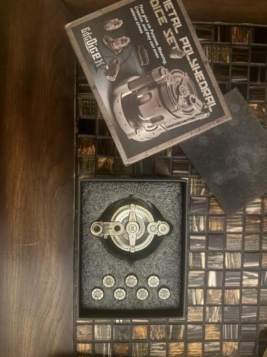 Metal Dice Set of 7, Rotatable Bullet Dice Set Revolver Storage Container photo review