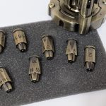Metal Dice Set of 7, Rotatable Bullet Dice Set Revolver Storage Container photo review
